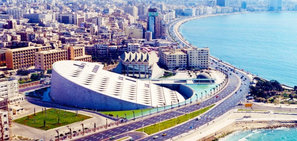 Modern Bibliotheca Alexandrina in Alexandria, Egypt, highlighted by Egypt Tour Magic for its circular design and engraved granite wall.