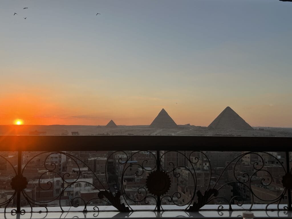 The Pyramids of Giza, including the Great Pyramid and the Sphinx, showcasing the timeless wonders of ancient Egypt