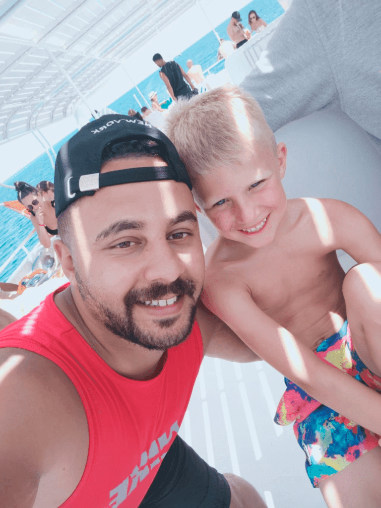 Manager and visitor on a boat in the Red Sea with Egypt Tour Magic.