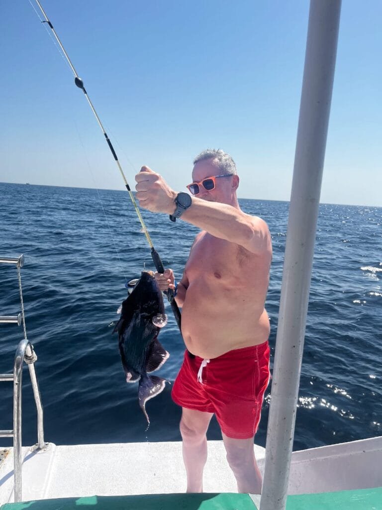 Visitor fishing in the Red Sea with Egypt Tour Magic.