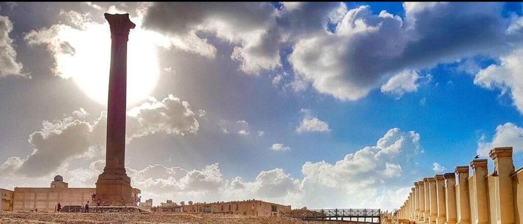 Pompey’s Pillar in Alexandria, highlighted by Egypt Tour Magic, showcasing ancient Roman architecture and grandeur.
