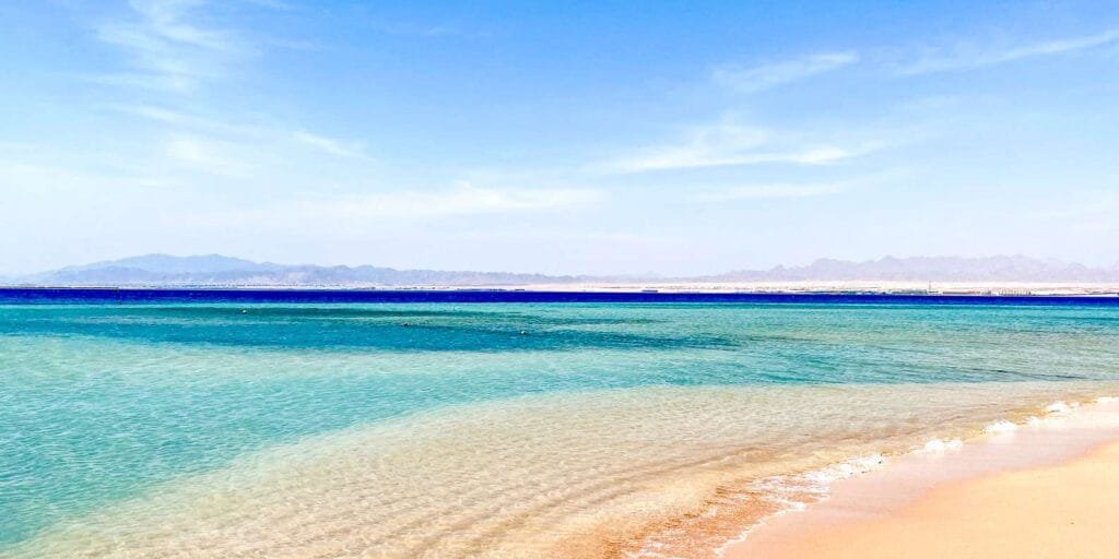 "El Gouna Beach, offering crystal-clear waters, golden sands, and water sports.