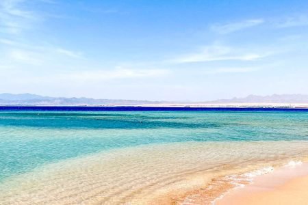 "El Gouna Beach, offering crystal-clear waters, golden sands, and water sports.