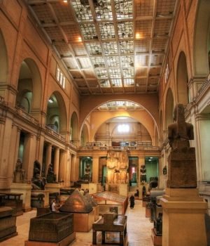 a large building with many statues in the egyptian museum