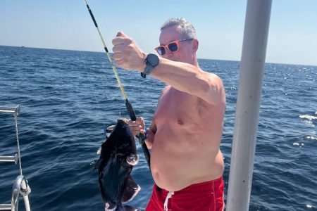 Visitor fishing in the Red Sea with Egypt Tour Magic.