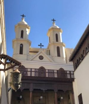 The Hanging Church in Cairo, a historic Coptic Christian church with intricate wooden ceilings and icons, built above a Roman gate.