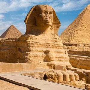 A beautiful profile of the Great Sphinx including the pyramids of Menkaure and Khafre in the background in Giza, Cairo, Egypt