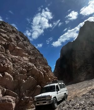 Jeep safari in Hurghada, navigating desert dunes and exploring local life.